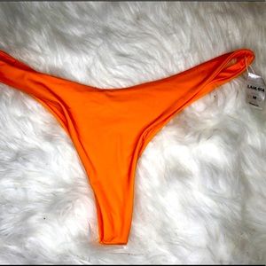 I am Gia orange neon thong bikini bottom